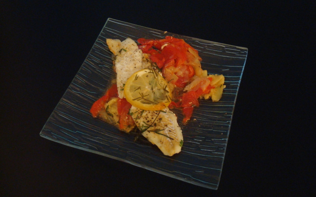 Filet de cabillaud sur lit de courgettes et d'oignons