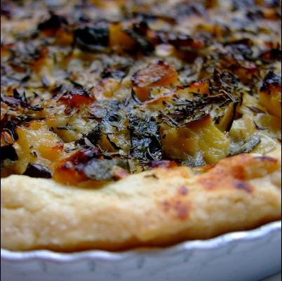 Tarte au confit de courgettes, parmesan et citrons confits