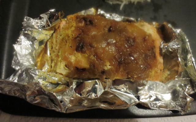 Papillotes de saumon au miel, curry et compotée d'oignons