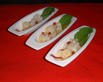 Dès de noix de pétoncles aux agrumes