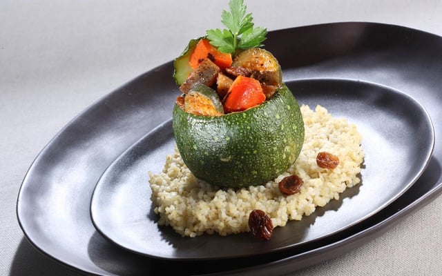 Mini courgette ronde farcie de Tajine de légumes grillés