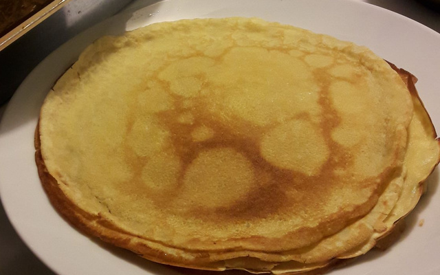 Crêpes parfumées au rhum et caramel à l'orange