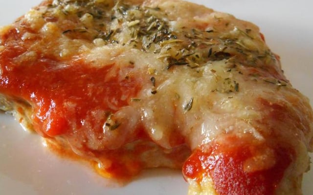 Côte de porc gratinée tomate & comté