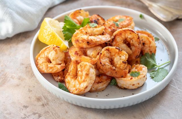 Crevettes sautées à l’ail, citron et herbes fraîches - Photo par 750g