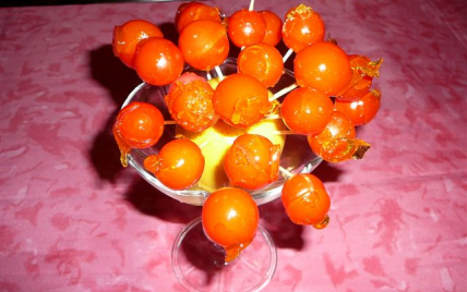 Présentoir de chupachups de tomates cerise caramélisées - Photo par claudeJmb