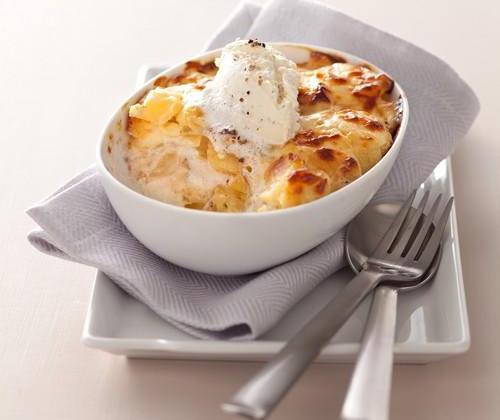 Gratin de pomme de terre à la dauphinoise au fromage à la Crème Elle & Vire, Ail et Fines herbes - Photo par Quiveutdufromage.com