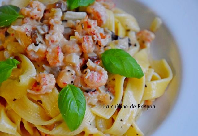 Pâtes et sauce crémeuse aux langoustines et champignons