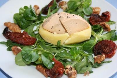 Pommes de terre au foie gras fondantes, roquette et tomates confites