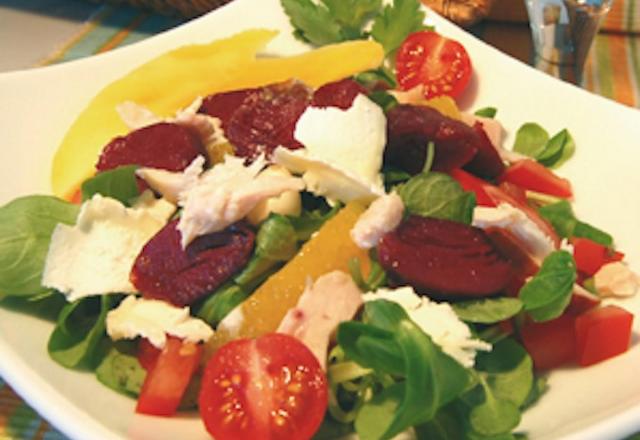 Salade de Gésiers de Canard maigre confits, vinaigrette tiède aux agrumes et pignons de pins torréfiés