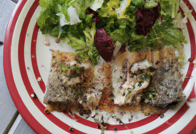 Filets de rouget à la tapenade et tuiles de parmesan accompagnés d'un mesclun