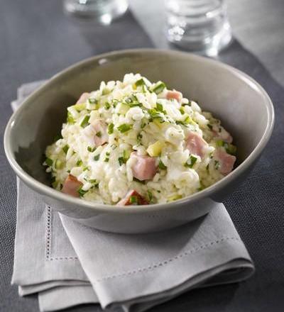 Risotto aux dés de rôti de porc braisés, courgettes et parmesan