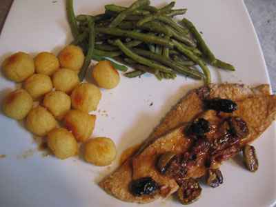 Rôti de veau aux olives et aux lardons fumés