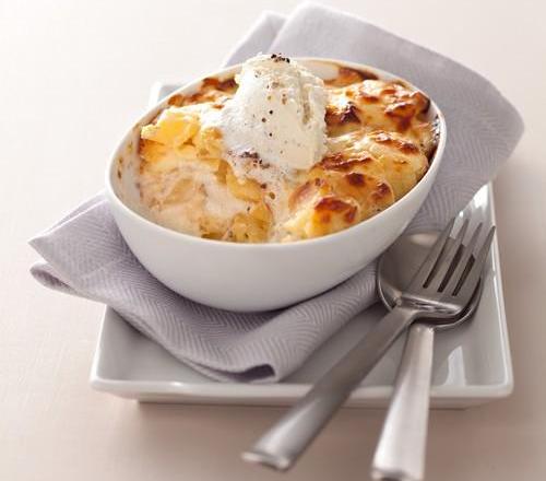 Gratin de pomme de terre à la dauphinoise au fromage à la Crème Elle & Vire, Ail et Fines herbes